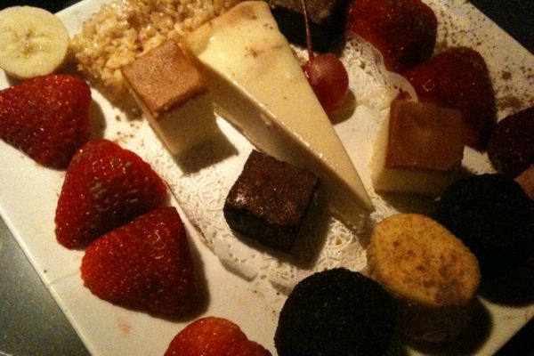 Dessert Assortment includes strawberries, banana, rice crispy treats, marshmallows, brownies, pound cake and cheesecake
