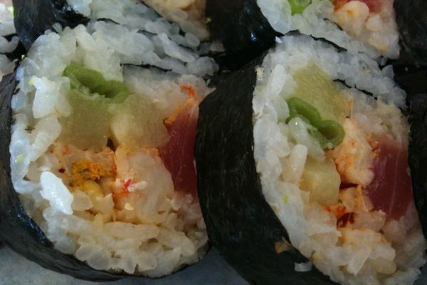 Sushi with crawfish, tuna, pineapple and green onion (close up)